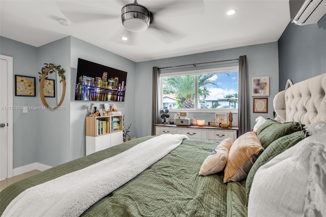 bedroom featuring recessed lighting, ceiling fan, baseboards, and a wall mounted air conditioner