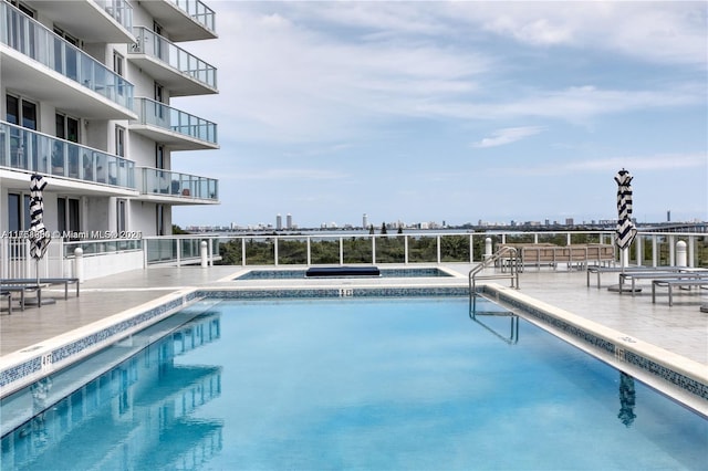 4250 Biscayne Blvd Unit 1512, Miami, FL 33137 - community pool featuring a community hot tub, a patio, and a view of city