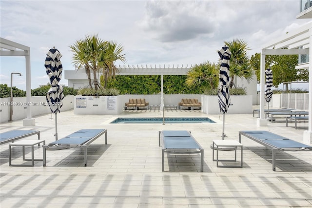 4250 Biscayne Blvd Unit 1512, Miami, FL 33137 - community pool with a pergola and a patio