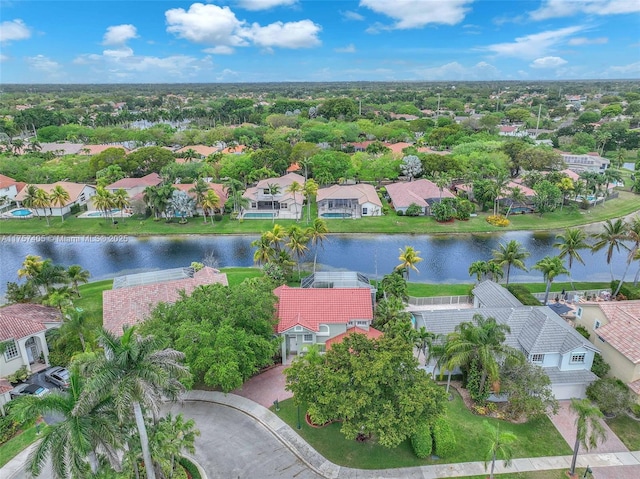 birds eye view of property featuring a residential view and a water view