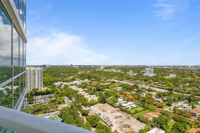 birds eye view of property with a city view