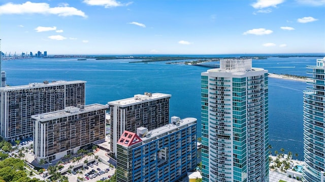 aerial view featuring a water view and a city view