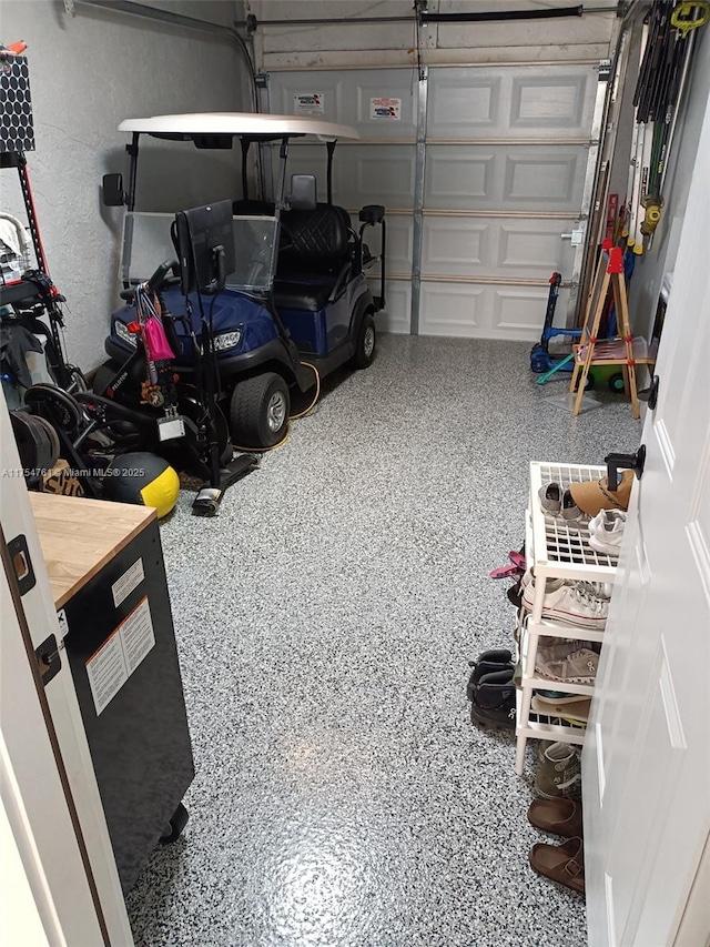 garage featuring a textured wall