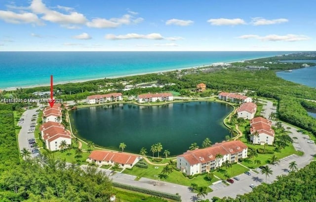 bird's eye view with a water view