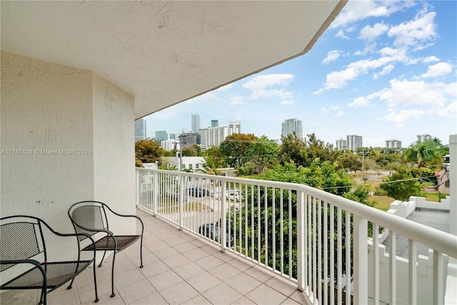 balcony featuring a view of city