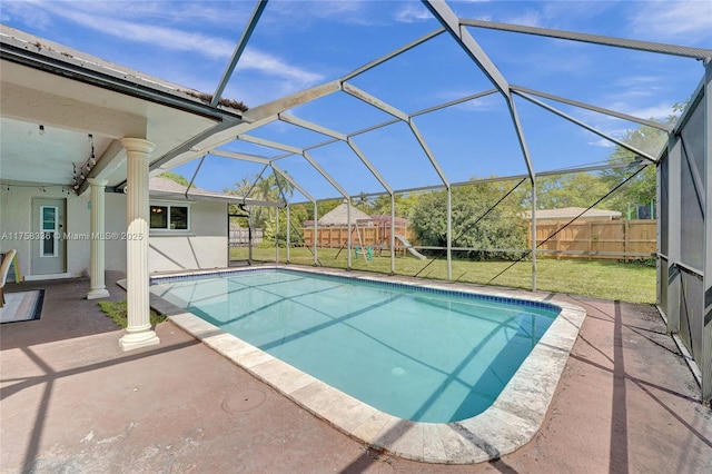 view of pool featuring a patio, a fenced in pool, a playground, a lawn, and a fenced backyard