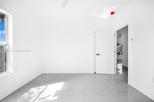 7990 NW 8th Ave, Miami, FL 33150 - empty room with baseboards