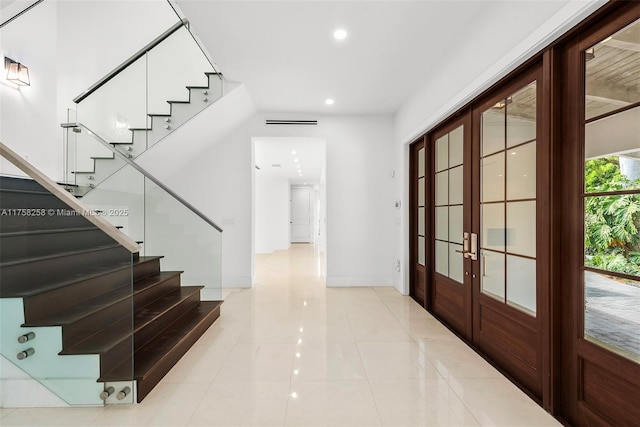 foyer entrance with baseboards, light tile patterned flooring, recessed lighting, stairs, and french doors