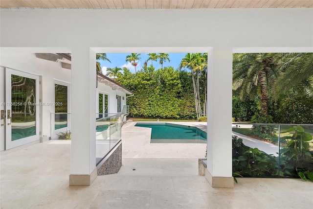 outdoor pool with a patio