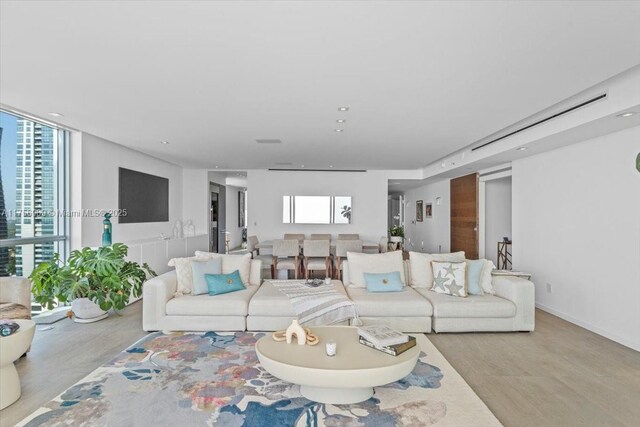 1331 Brickell Bay Dr Unit 4211, Miami, FL 33131 - living area featuring wood finished floors and a wall of windows