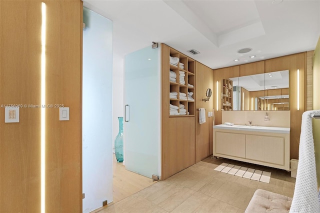 1331 Brickell Bay Dr Unit 4211, Miami, FL 33131 - bathroom featuring vanity and a tray ceiling