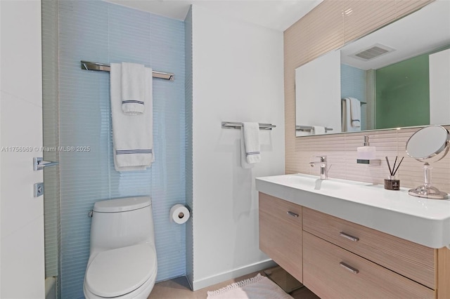1331 Brickell Bay Dr Unit 4211, Miami, FL 33131 - bathroom with vanity, tasteful backsplash, toilet, and a shower