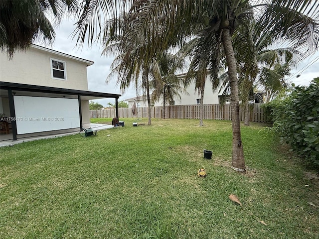 view of yard featuring fence private yard