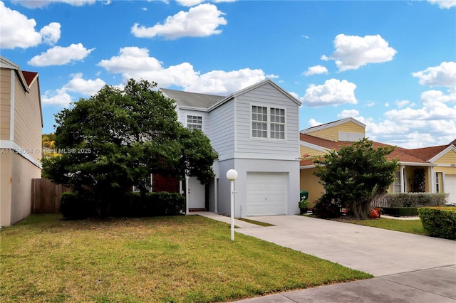 traditional-style home with a front yard, fence, stucco siding, concrete driveway, and a garage