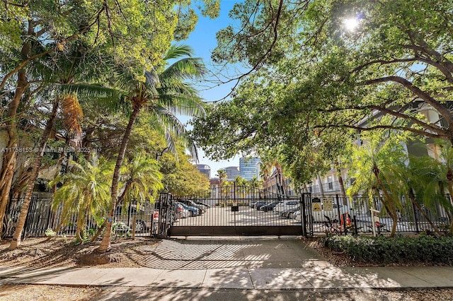 view of gate featuring fence