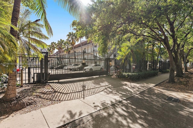 view of gate featuring fence