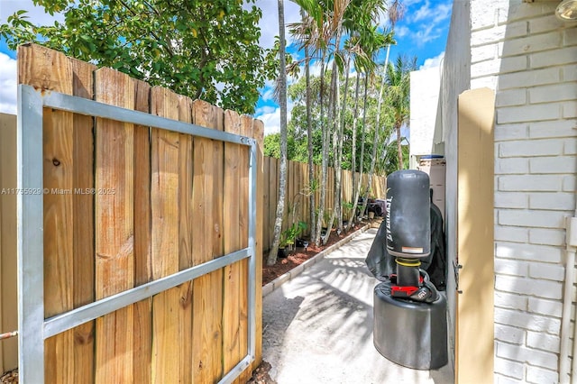 view of patio featuring fence