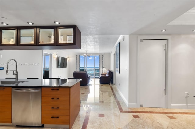 kitchen featuring baseboards, dishwasher, an inviting chandelier, a sink, and recessed lighting