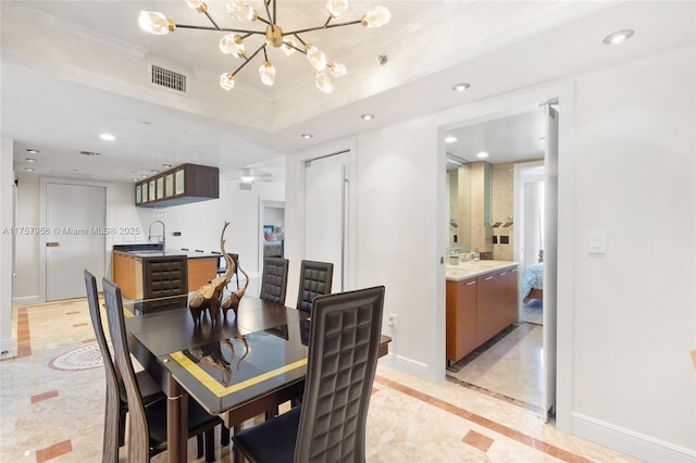 dining space featuring recessed lighting, visible vents, baseboards, ornamental molding, and a raised ceiling