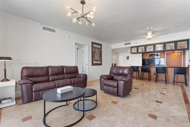 living area featuring marble finish floor, ornamental molding, visible vents, and baseboards