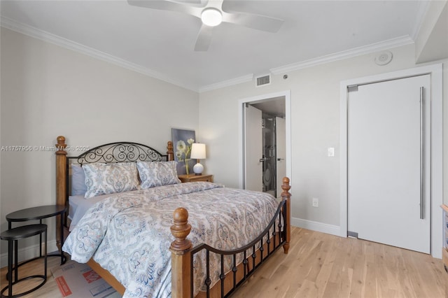 bedroom featuring ceiling fan, light wood-style flooring, visible vents, baseboards, and crown molding