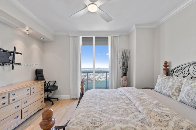 bedroom featuring ceiling fan, baseboards, access to outside, light wood-type flooring, and crown molding