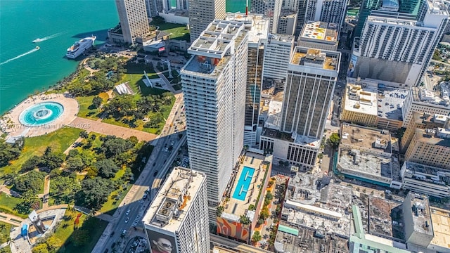 drone / aerial view featuring a water view and a city view