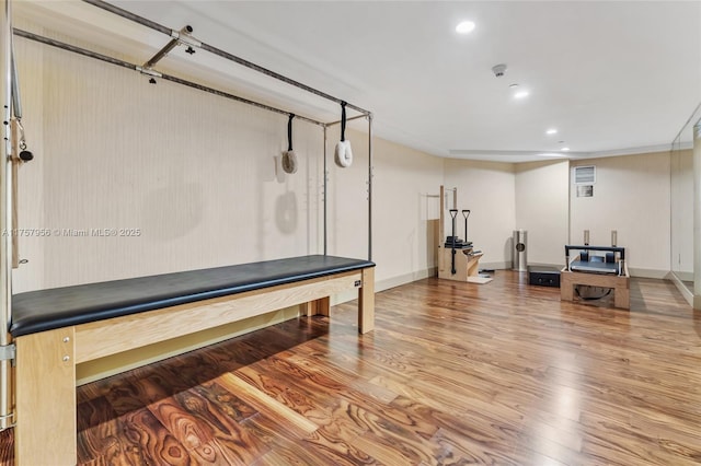 playroom with recessed lighting, baseboards, and wood finished floors