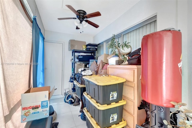 storage area with a ceiling fan