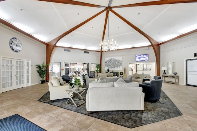 tiled living room featuring an inviting chandelier, french doors, visible vents, and high vaulted ceiling