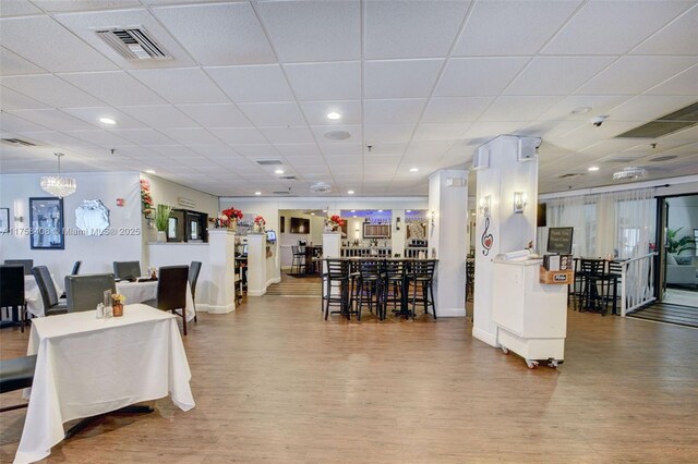 dining area featuring visible vents, recessed lighting, and wood finished floors