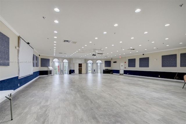 workout room with visible vents, recessed lighting, and ornamental molding