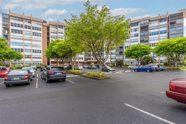 view of property with uncovered parking