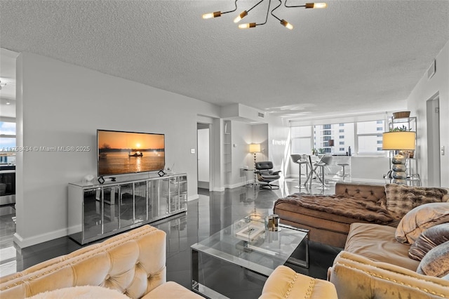 living room with visible vents, a textured ceiling, and baseboards