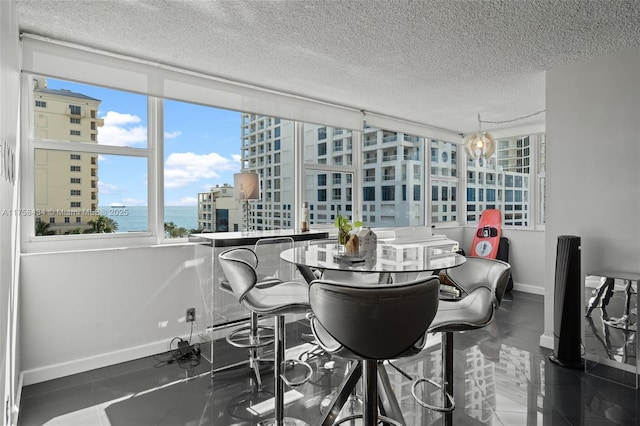 sunroom / solarium with a view of city