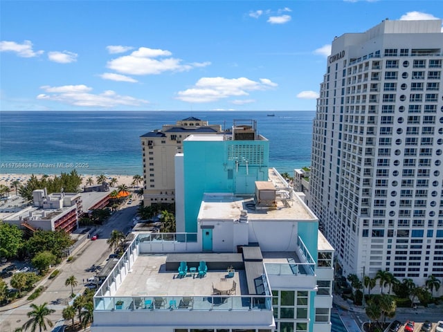 drone / aerial view with a water view and a city view