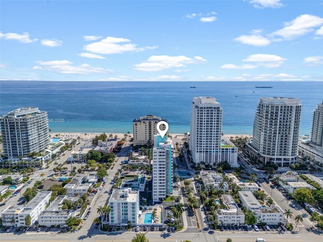 bird's eye view with a water view and a view of city