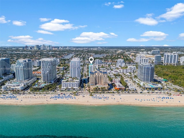 aerial view featuring a view of city, a water view, and a view of the beach