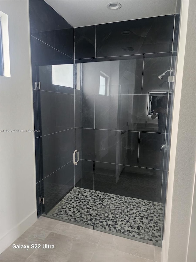 full bathroom with a stall shower