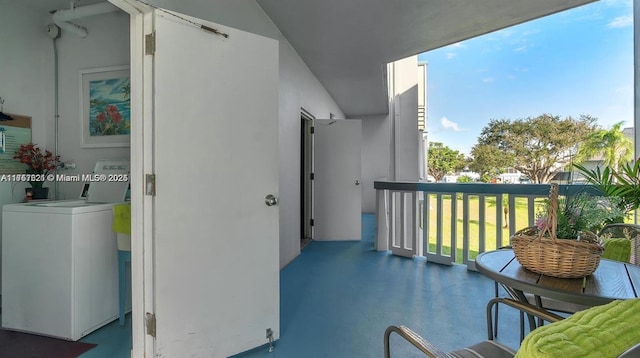 balcony featuring washer / dryer