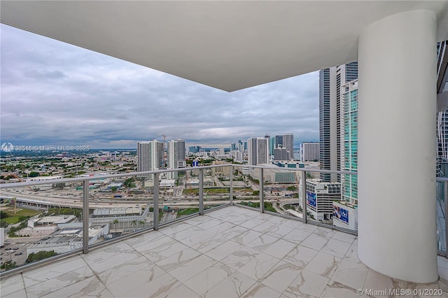 balcony featuring a view of city