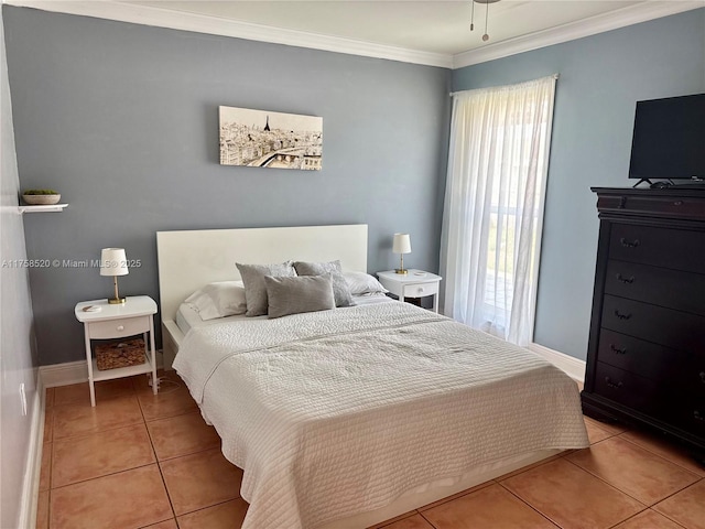 tiled bedroom featuring ornamental molding and baseboards