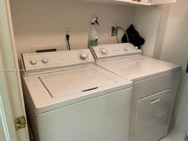 laundry area with laundry area and washer and dryer