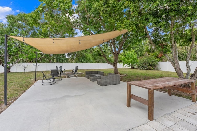 view of patio / terrace featuring a fenced backyard and outdoor lounge area