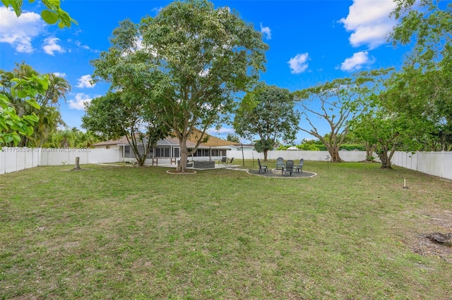 view of yard with a patio area and a fenced backyard