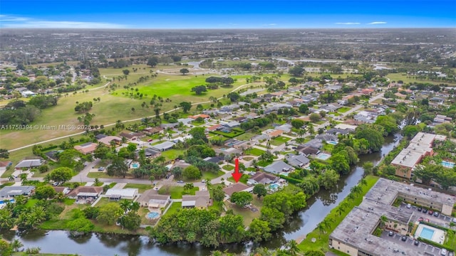 bird's eye view featuring a residential view and a water view