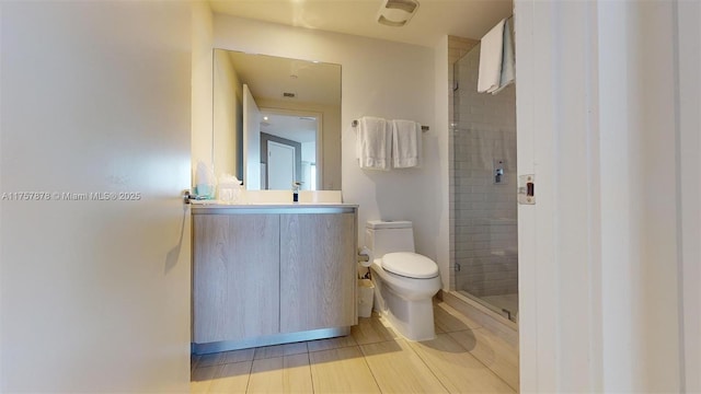 full bath with toilet, a stall shower, and vanity