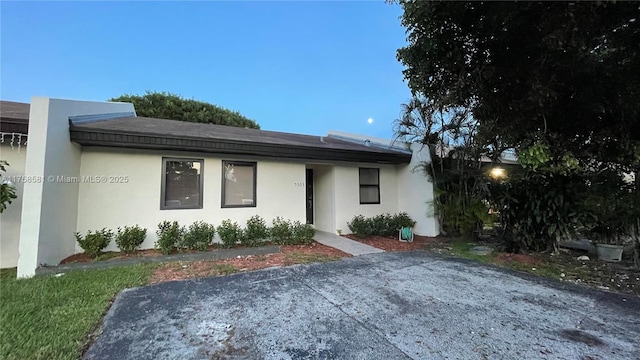 view of front of home featuring stucco siding