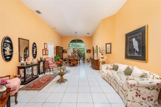 living room featuring visible vents and light tile patterned flooring