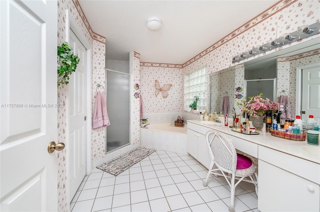 full bathroom with double vanity, a stall shower, a garden tub, and wallpapered walls